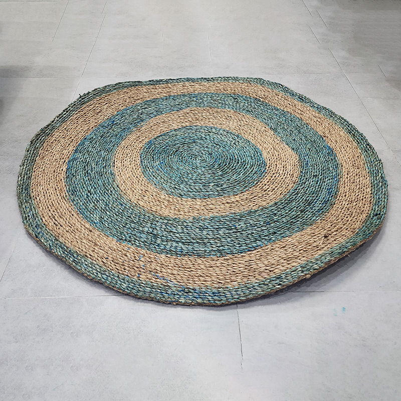 Seagrass placemats rugs and decorative wall accents in hospitality environment