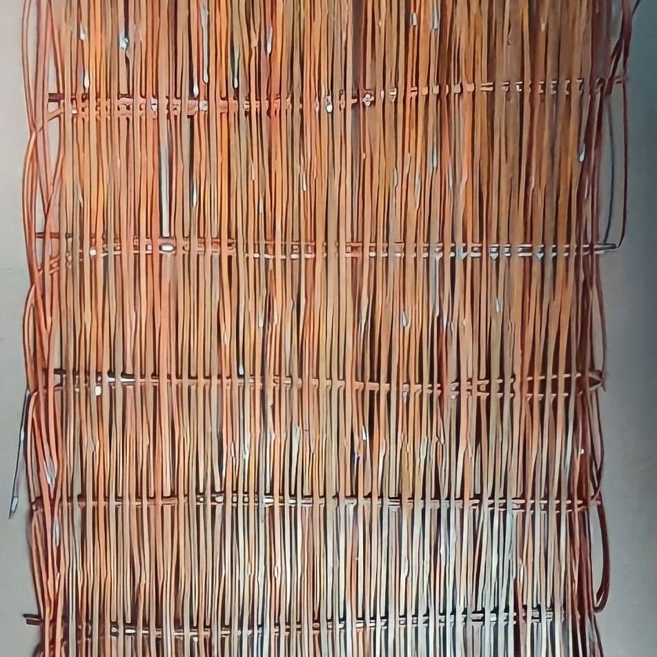 Woven willow fence panels installed for boundary privacy screening in residential garden landscape